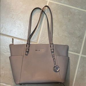 Well loved Michael Kors purse